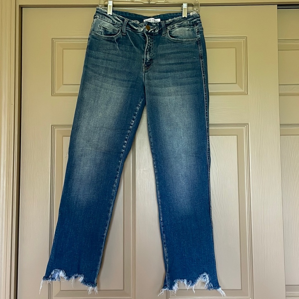 Flying Monkey distressed hem jeans.